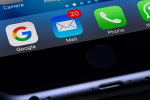 close up shot of phone displaying email app